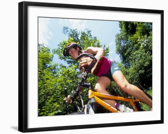 Young Female Recreational Mountain Biker Riding in the Forest-null-Framed Photographic Print