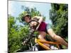 Young Female Recreational Mountain Biker Riding in the Forest-null-Mounted Photographic Print