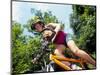 Young Female Recreational Mountain Biker Riding in the Forest-null-Mounted Photographic Print