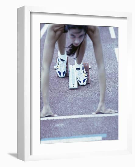 Young Female Runner at the Starting Position-null-Framed Photographic Print