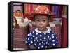 Young Girl Beside a Road-Side Stall Near Antananarivo, Capital of Madagascar-Nigel Pavitt-Framed Stretched Canvas