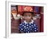 Young Girl Beside a Road-Side Stall Near Antananarivo, Capital of Madagascar-Nigel Pavitt-Framed Photographic Print