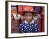 Young Girl Beside a Road-Side Stall Near Antananarivo, Capital of Madagascar-Nigel Pavitt-Framed Photographic Print