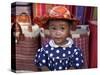 Young Girl Beside a Road-Side Stall Near Antananarivo, Capital of Madagascar-Nigel Pavitt-Stretched Canvas