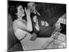 Young Girl Drinking the Remains of the Other Glasses on the Table after Finishing Her Own Champagne-null-Mounted Photographic Print