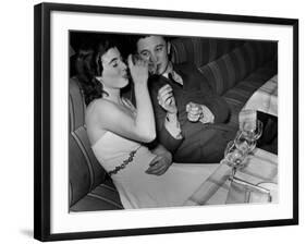 Young Girl Drinking the Remains of the Other Glasses on the Table after Finishing Her Own Champagne-null-Framed Photographic Print