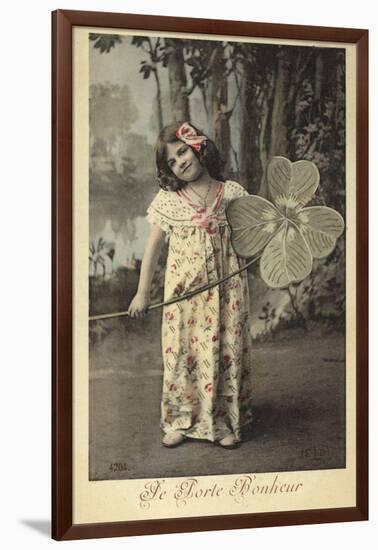 Young Girl Holding Giant Four-Leaf Clover-null-Framed Photographic Print