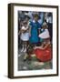 Young Girl in a Bonnet and a Red Dress Feeding an Organ Grinder's Monkey, Iowa State Fair, 1955-John Dominis-Framed Photographic Print