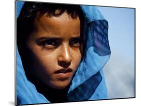 Young Girl in Characteristic Saharan Blue Headscarf Looking into Distance, Sahara, Southern Morocco-Mark Hannaford-Mounted Photographic Print