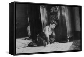 Young Girl Listens to the Radio While Reading Paper, Ca. 1930-null-Framed Stretched Canvas