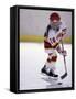 Young Girl Playing Ice Hockey-null-Framed Stretched Canvas