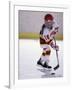 Young Girl Playing Ice Hockey-null-Framed Photographic Print