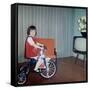 Young Girl Rides Her New Tricycle in the House, Ca. 1967-null-Framed Stretched Canvas