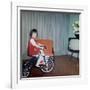 Young Girl Rides Her New Tricycle in the House, Ca. 1967-null-Framed Photographic Print