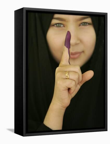 Young Girl Shows Her Inked Finger, Even Though She Was Too Young to Vote, in Karbala, Iraq-null-Framed Stretched Canvas