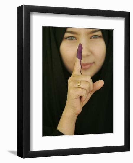 Young Girl Shows Her Inked Finger, Even Though She Was Too Young to Vote, in Karbala, Iraq-null-Framed Photographic Print