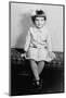 Young Girl Sits on a Sofa, Ca. 1933-null-Mounted Photographic Print