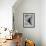 Young Girl Soars Upwards Dressed as a Butterfly-null-Framed Photographic Print displayed on a wall