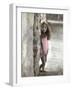 Young Girl Standing Against a Stone Wall-Nora Hernandez-Framed Giclee Print