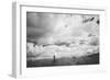 Young Girl Standing in a Field with Clouds-Clive Nolan-Framed Photographic Print