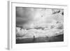 Young Girl Standing in a Field with Clouds-Clive Nolan-Framed Photographic Print