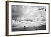 Young Girl Standing in a Field with Clouds-Clive Nolan-Framed Photographic Print