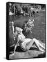 Young Girl Sunbathing at the Venetian Pool-Allan Grant-Framed Stretched Canvas