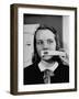 Young Girl Trying to Determine Which Lipstick Color Will Look Right with Her Complexion-Nina Leen-Framed Photographic Print