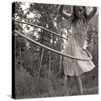 Young Girl Twirling Hula Hoop Outdoors In Sepia For Vintage Look-CherylCasey-Stretched Canvas