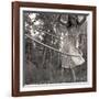 Young Girl Twirling Hula Hoop Outdoors In Sepia For Vintage Look-CherylCasey-Framed Art Print