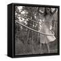 Young Girl Twirling Hula Hoop Outdoors In Sepia For Vintage Look-CherylCasey-Framed Stretched Canvas