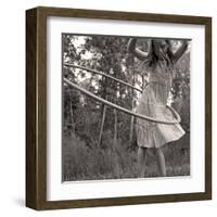 Young Girl Twirling Hula Hoop Outdoors In Sepia For Vintage Look-CherylCasey-Framed Art Print