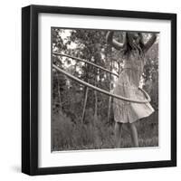 Young Girl Twirling Hula Hoop Outdoors In Sepia For Vintage Look-CherylCasey-Framed Art Print