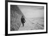 Young Girl Walking Beside the Sea Wall in England During Winter-Clive Nolan-Framed Photographic Print