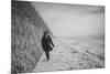 Young Girl Walking Beside the Sea Wall in England During Winter-Clive Nolan-Mounted Photographic Print