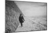 Young Girl Walking Beside the Sea Wall in England During Winter-Clive Nolan-Mounted Photographic Print