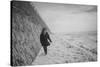 Young Girl Walking Beside the Sea Wall in England During Winter-Clive Nolan-Stretched Canvas
