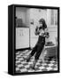 Young Girl Wearing Cowgirl Outfit Drinking Milk and Eating Sandwich in Kitchen-Nina Leen-Framed Stretched Canvas