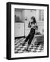 Young Girl Wearing Cowgirl Outfit Drinking Milk and Eating Sandwich in Kitchen-Nina Leen-Framed Photographic Print