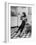 Young Girl Wearing Cowgirl Outfit Drinking Milk and Eating Sandwich in Kitchen-Nina Leen-Framed Photographic Print