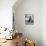 Young Girl Wearing Cowgirl Outfit Drinking Milk and Eating Sandwich in Kitchen-Nina Leen-Mounted Photographic Print displayed on a wall