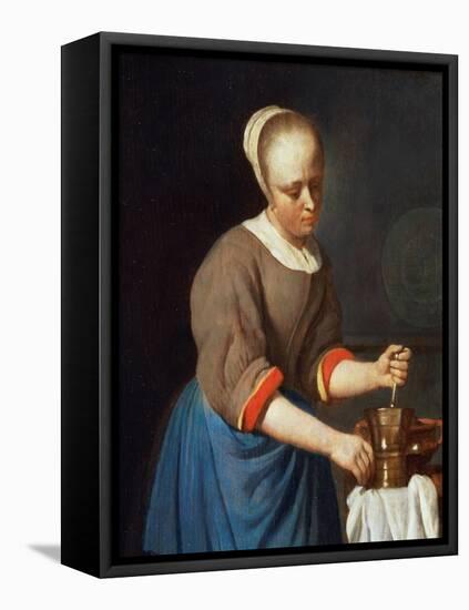 Young Girl with a Pestle and Mortar-Gabriel Metsu-Framed Stretched Canvas