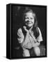 Young Girl with Long Hair and Raggedy Shirt, Smiling, Wearing Seed Pod on Nose-Ralph Morse-Framed Stretched Canvas