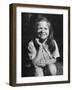 Young Girl with Long Hair and Raggedy Shirt, Smiling, Wearing Seed Pod on Nose-Ralph Morse-Framed Photographic Print