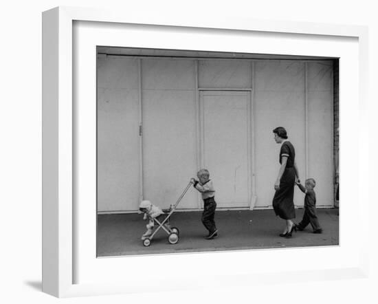 Young Housewife Walking with Her Three Children-Mark Kauffman-Framed Photographic Print