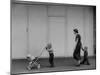 Young Housewife Walking with Her Three Children-Mark Kauffman-Mounted Photographic Print