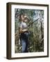 Young Hunter Blowing a Duck Decal Wistle while Holding His Rifle under His Arm-Al Fenn-Framed Photographic Print