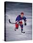 Young Ice Hockey Player in Action-null-Stretched Canvas