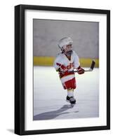 Young Ice Hockey Player in Action-null-Framed Photographic Print