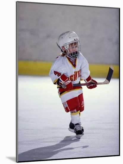 Young Ice Hockey Player in Action-null-Mounted Photographic Print